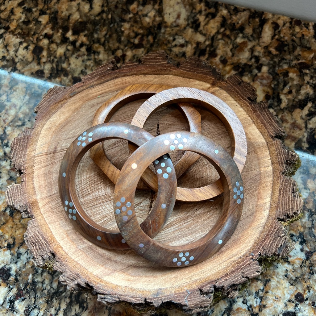 4 Ae Wooden Bracelets 6$